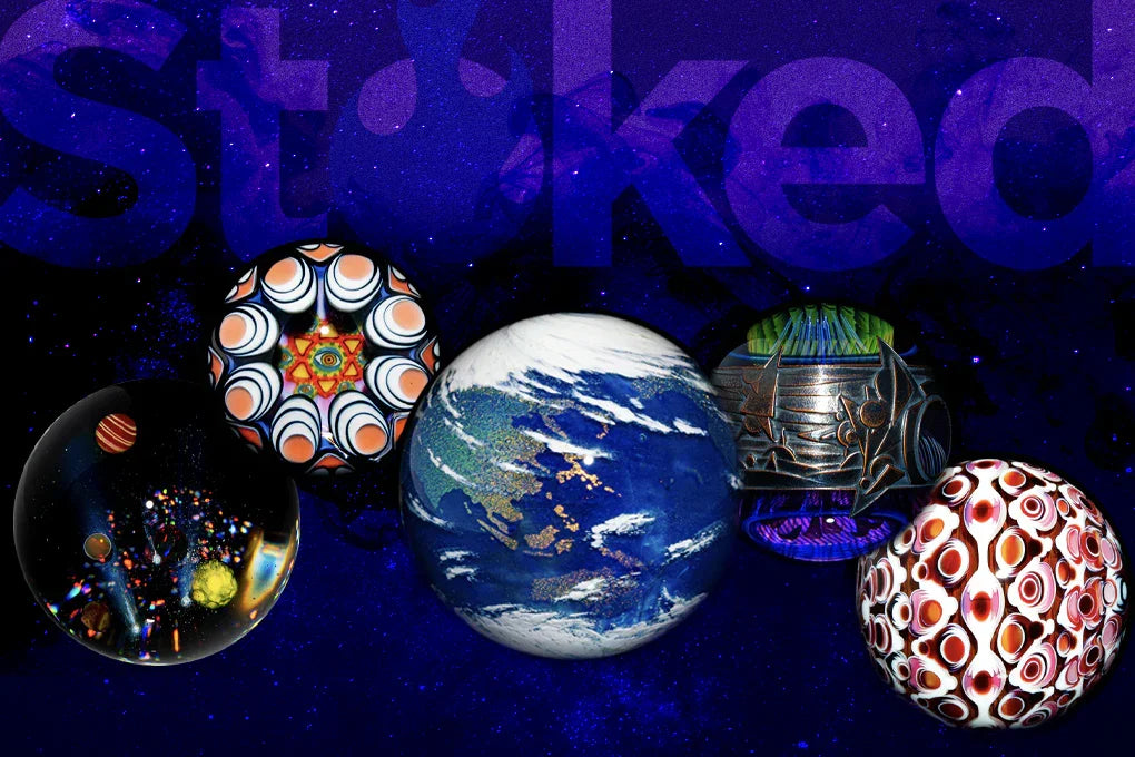 Various marbles on a purple backround