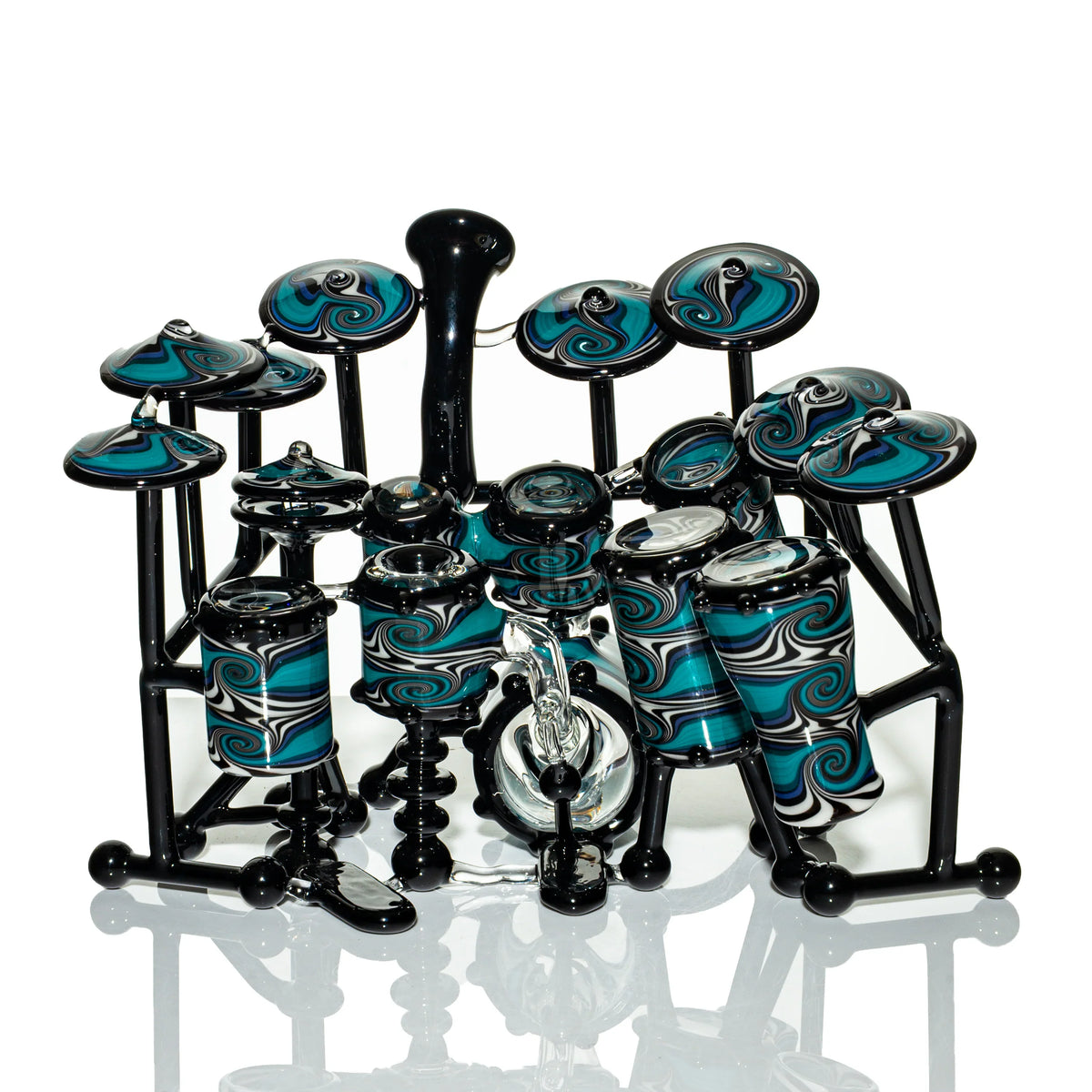 Aqua azul hand-blown glass dab rig with a drum design by AJ Roberts