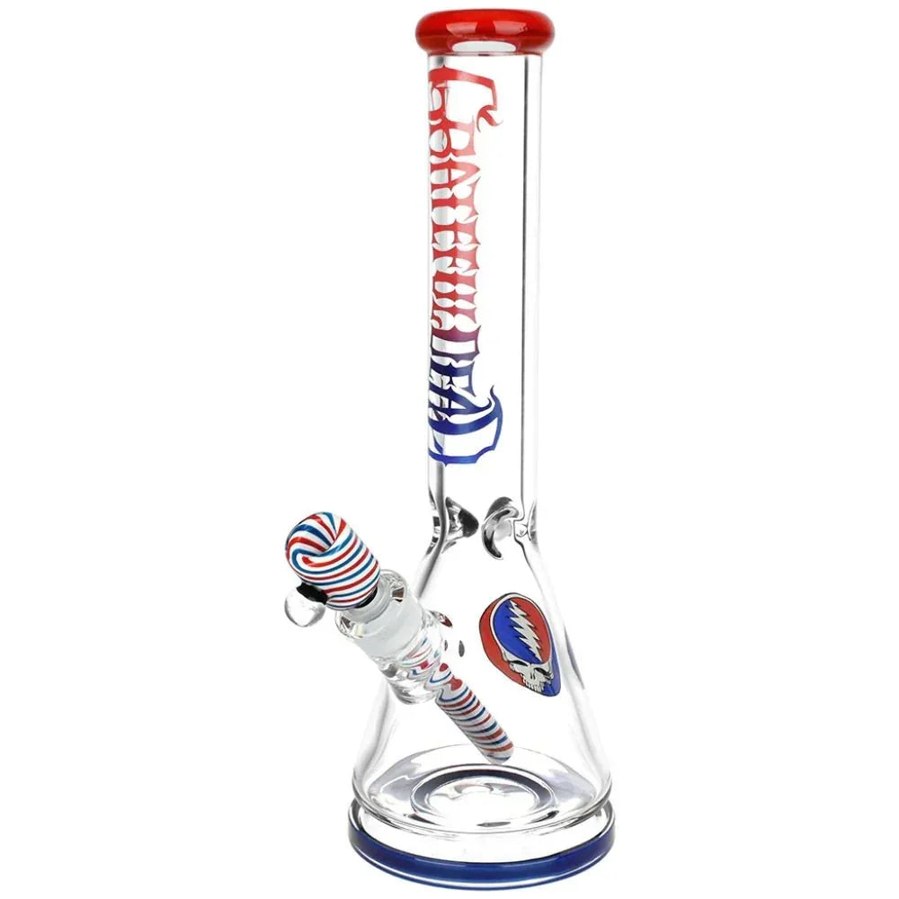 Clear glass beaker bong with Grateful Dead logo, red and blue striped accents