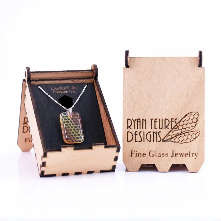Honeycomb patterned glass pendant necklace in wooden display box, fine glass jewelry.