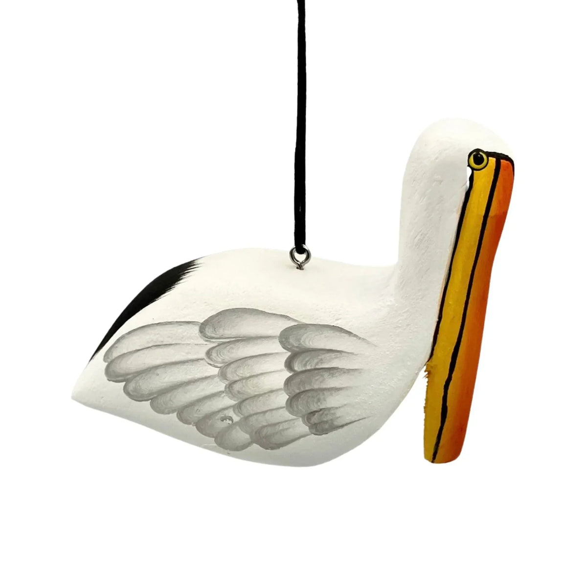 Hand-painted pelican ornament with gray wings and yellow-orange beak, hanging by black cord