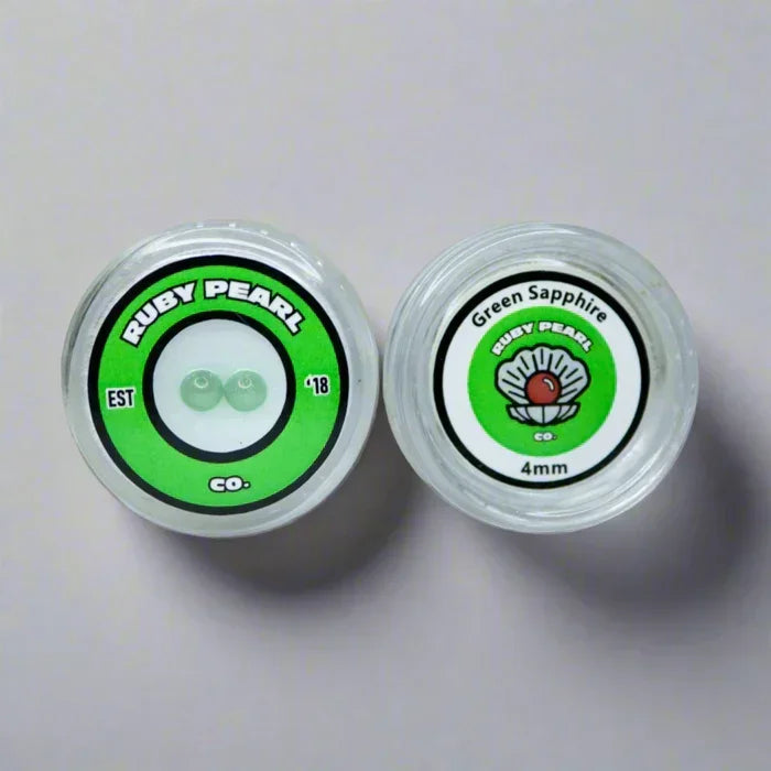 Green sapphire terp pearls in clear containers labeled Ruby Pearl Co, 4mm dabbing accessory