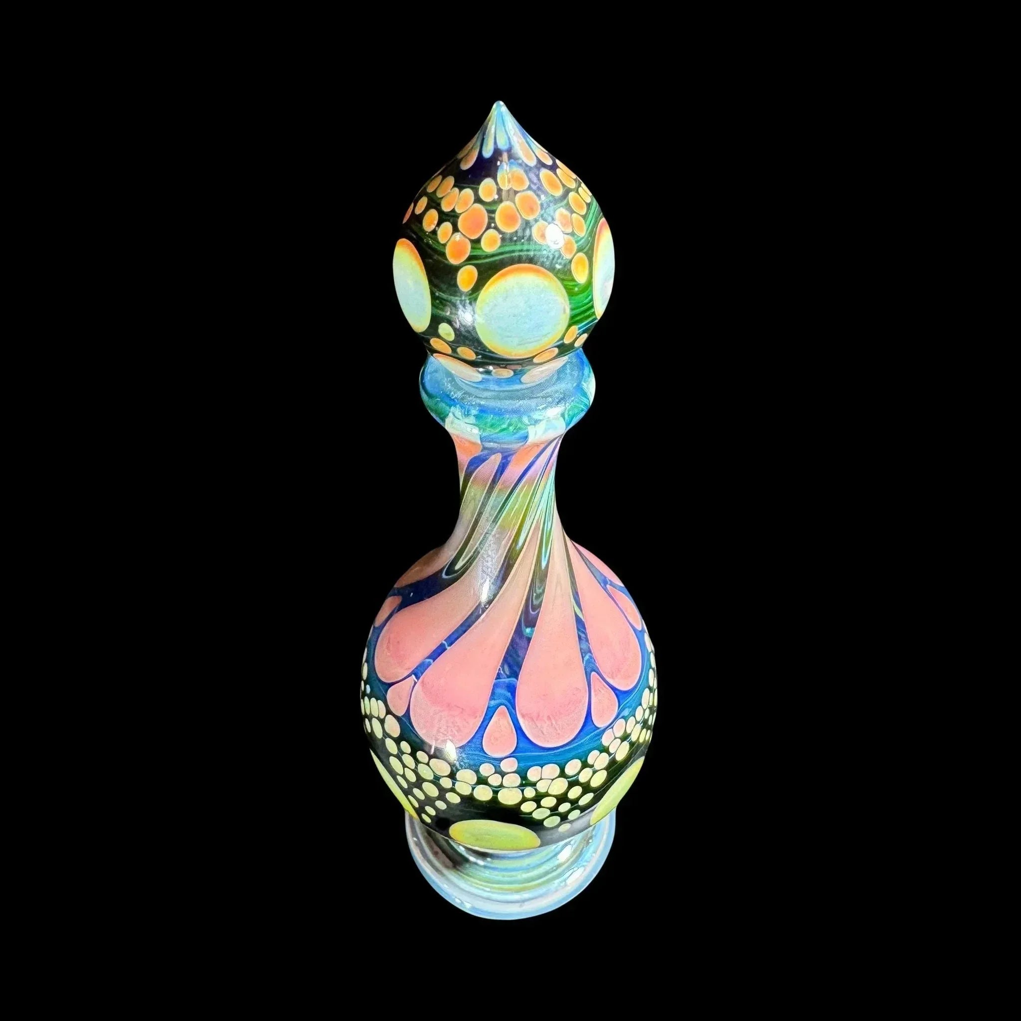 Heady glass art bottle with colorful swirls, marbles, and intricate dot patterns on black background.