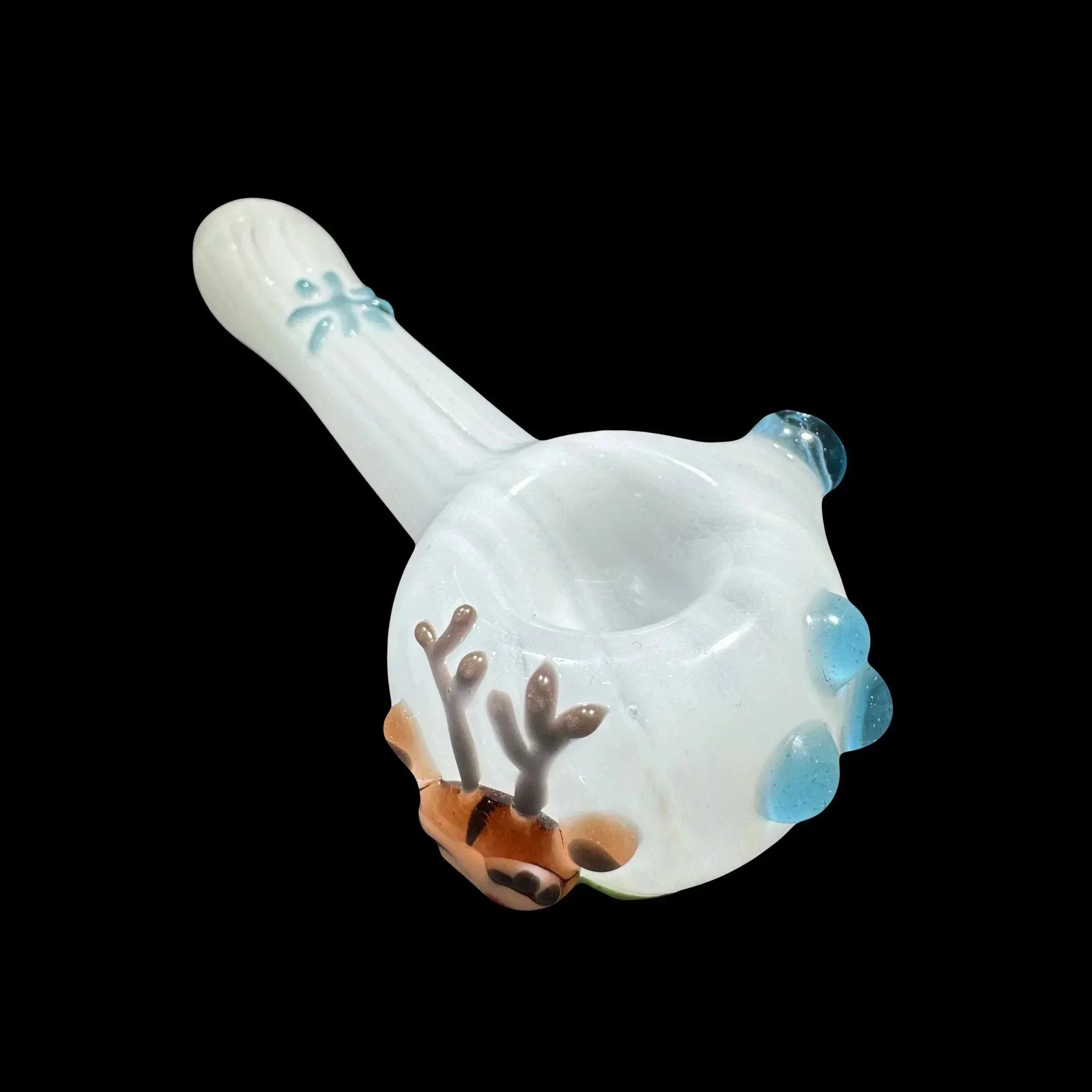 White glass hand pipe with reindeer and blue snow accents on black background