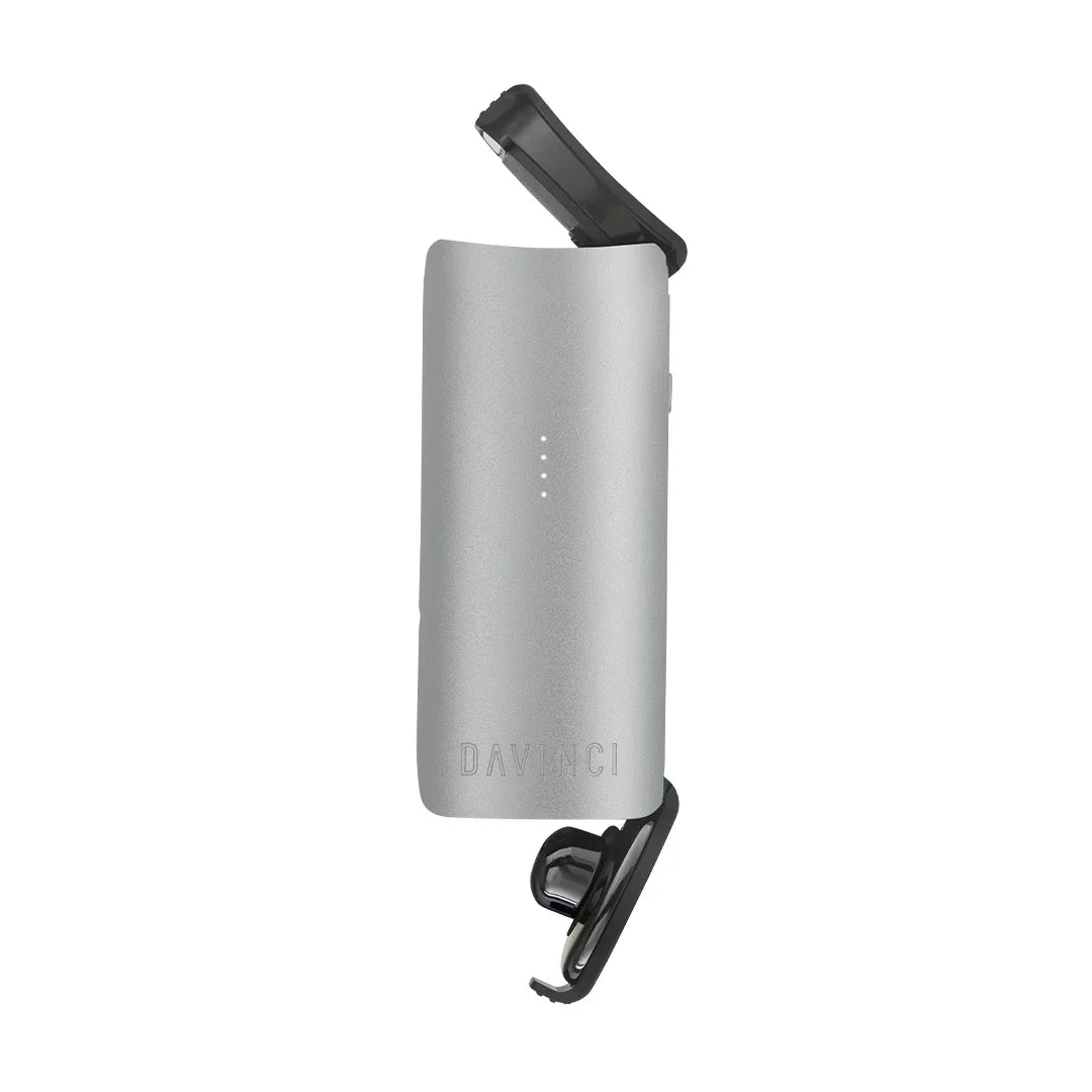 Silver DaVinci portable vaporizer with open mouthpiece, isolated on white background