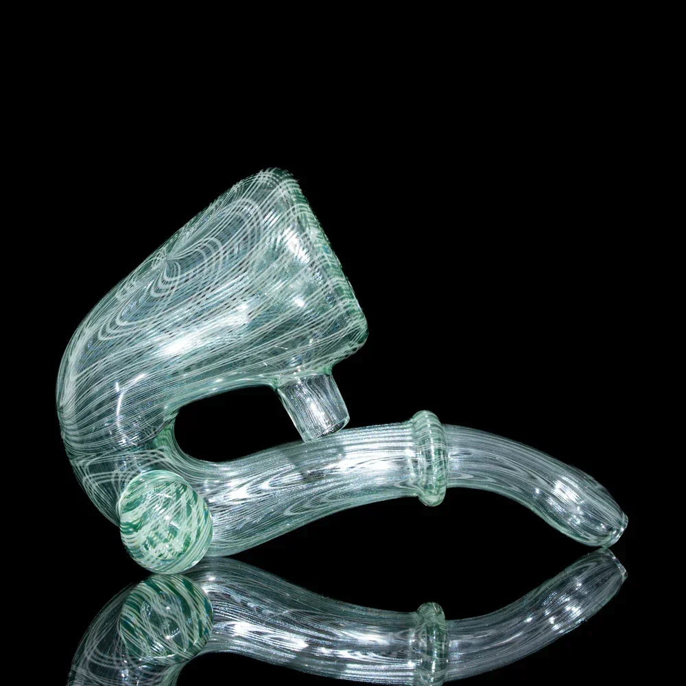 Clear glass sherlock pipe with intricate swirled patterns on black background