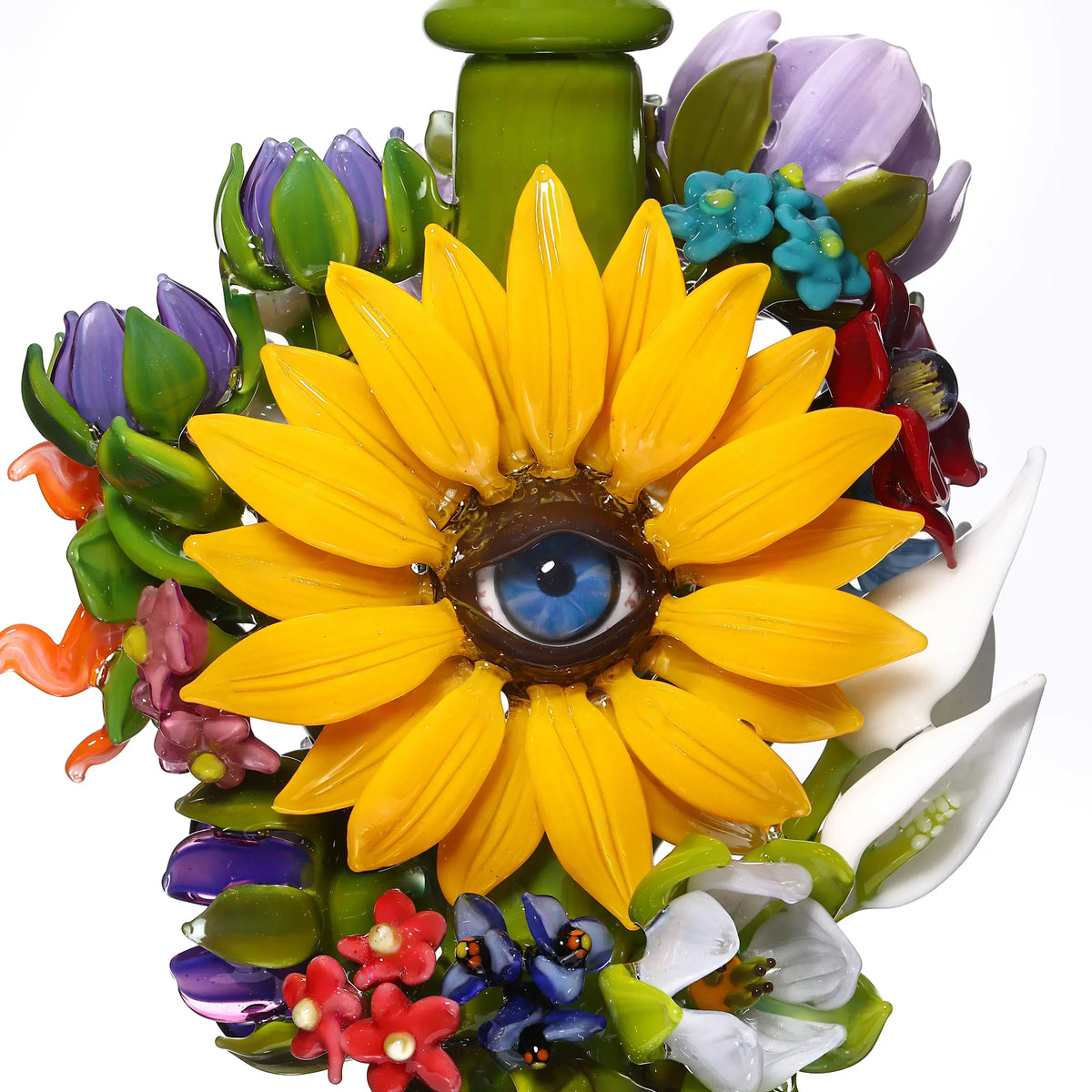 Hand-blown glass art featuring a sunflower with an eye and colorful floral details.