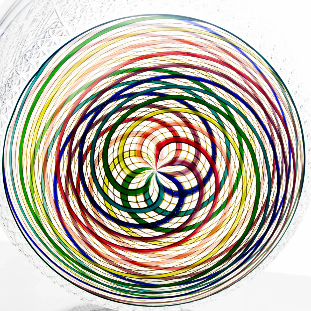 Close-up of colorful glass art with spiral rainbow pattern and intricate details