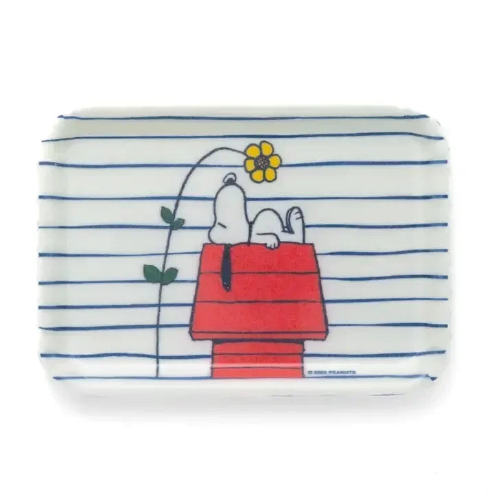 Vintage-style tray with cartoon dog on red doghouse, blue stripes, and yellow flower design.