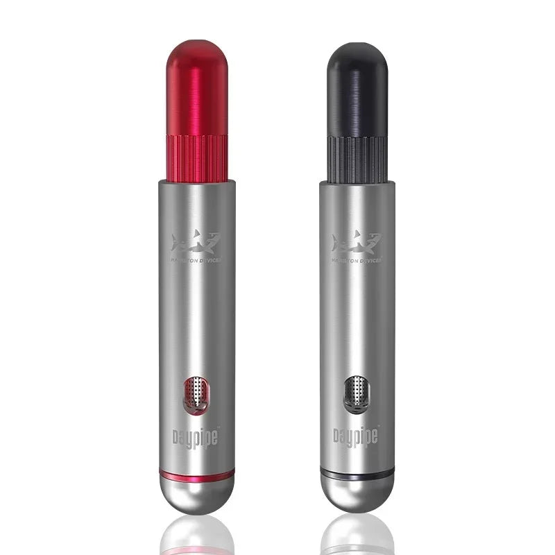 Two metallic portable herb pipes, one with a red cap and one with a black cap, side by side.