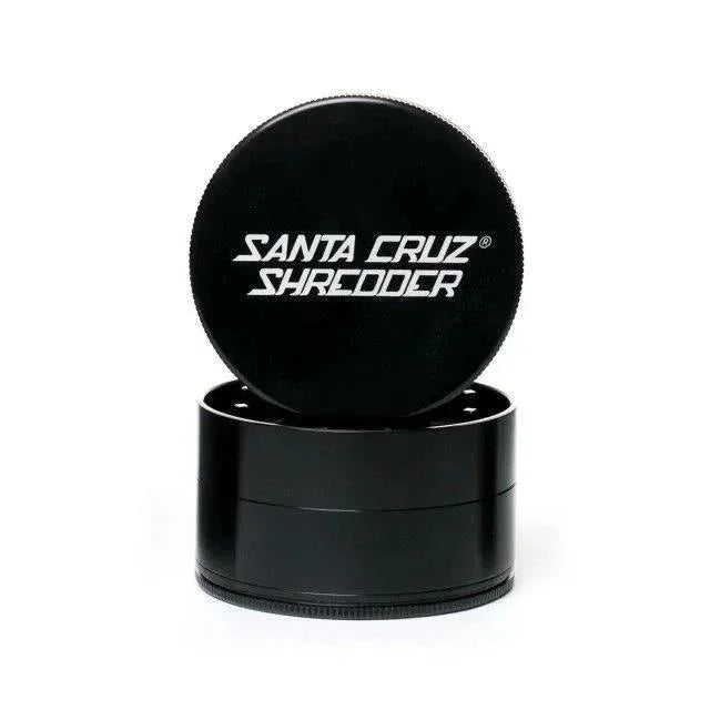 Large black 4-piece herb grinder labeled Santa Cruz Shredder on white background