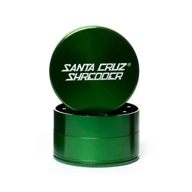 Large green 4-piece herb grinder with Santa Cruz Shredder logo on lid