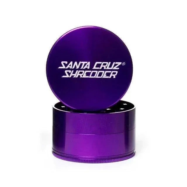 Large four-piece purple metal herb grinder with etched Santa Cruz Shredder logo