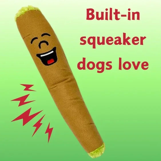 Funny plush dog toy shaped like a blunt with a smiling face, featuring text 'Built-in squeaker dogs love' on a green background.