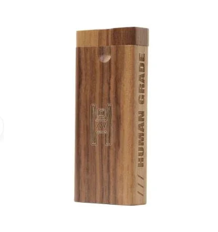 Wooden stash box with engraved logo and 'HUMAN GRADE' text, storage accessory