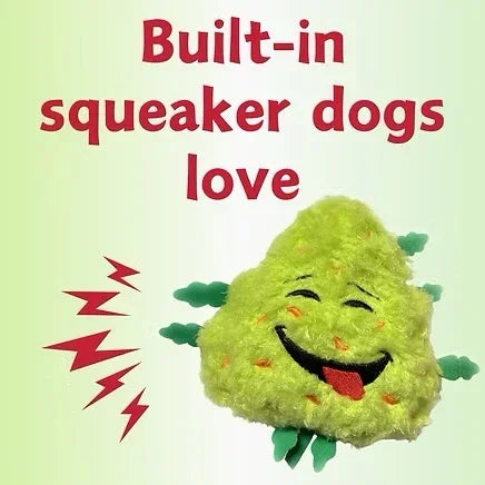Plush dog toy with built-in squeaker, smiling face, and green fuzzy texture.