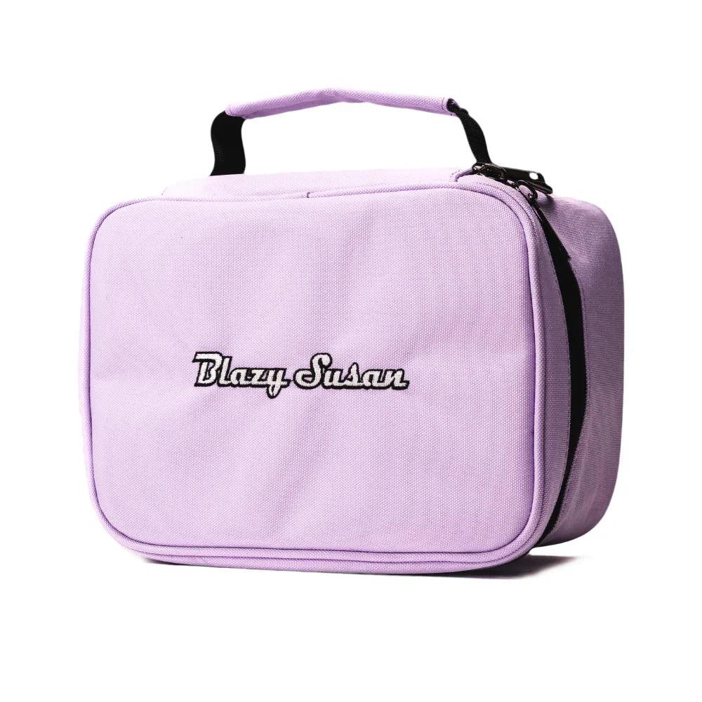 Light purple Blazy Susan smell proof carrying case with handle and zipper, isolated on white