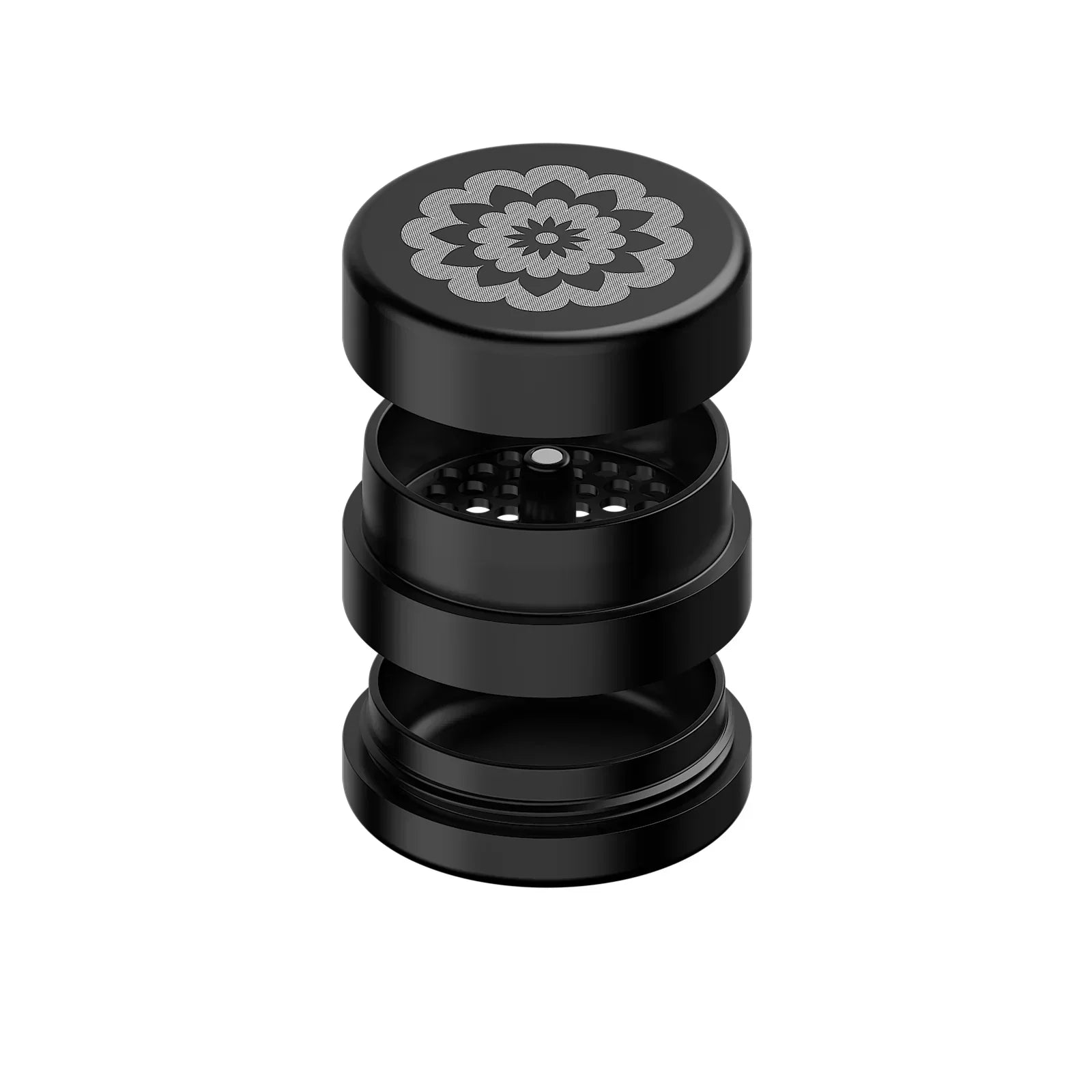 Black metal herb grinder with floral engraving, open to show multiple chambers