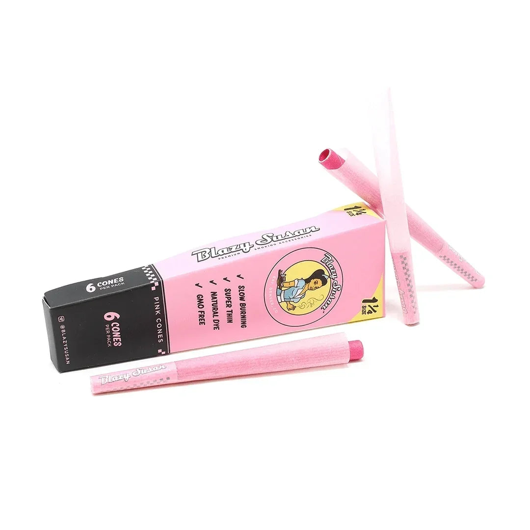 Blazy Susan pink cone rolling papers 6-pack, natural dye, slow burning, on white background.