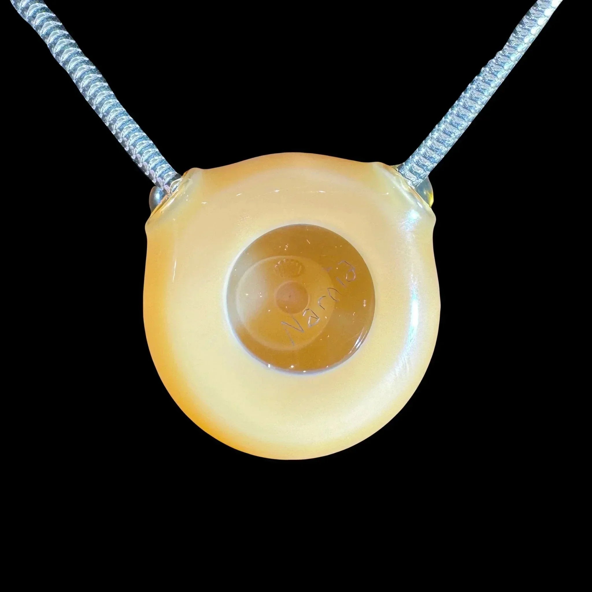 Translucent orange glass pendant necklace with central accent, heady glass accessory