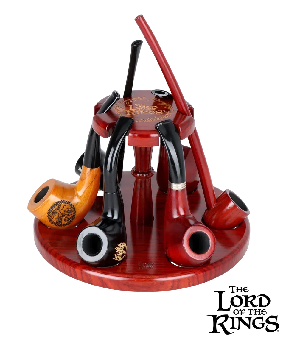 Lord of the Rings themed wooden pipe set with stand, several carved tobacco pipes on display