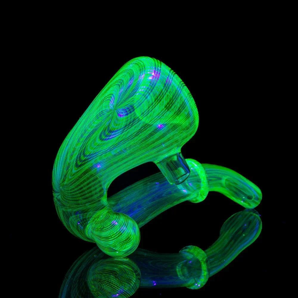 UV reactive green swirling glass pipe with reflective surface, heady glass art