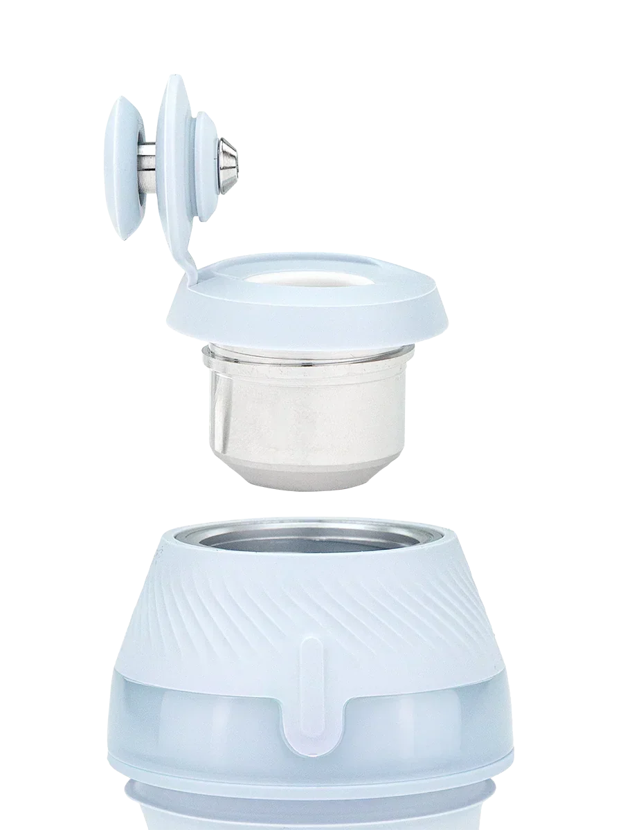 White vaporizer atomizer chamber with open cap, featuring stainless steel interior