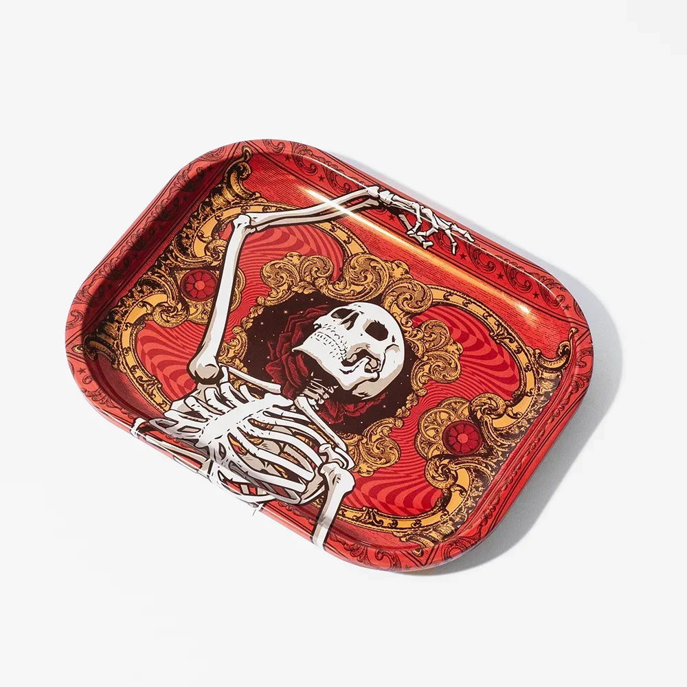 Rectangular rolling tray with ornate red and gold skeleton design, decorative smoking accessory.