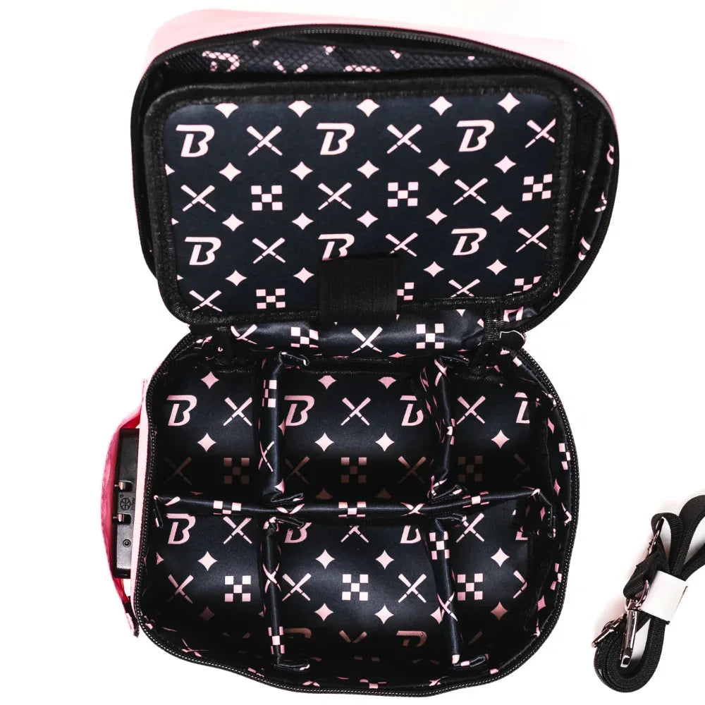 Black and pink padded carrying case with compartments and detachable strap, open view