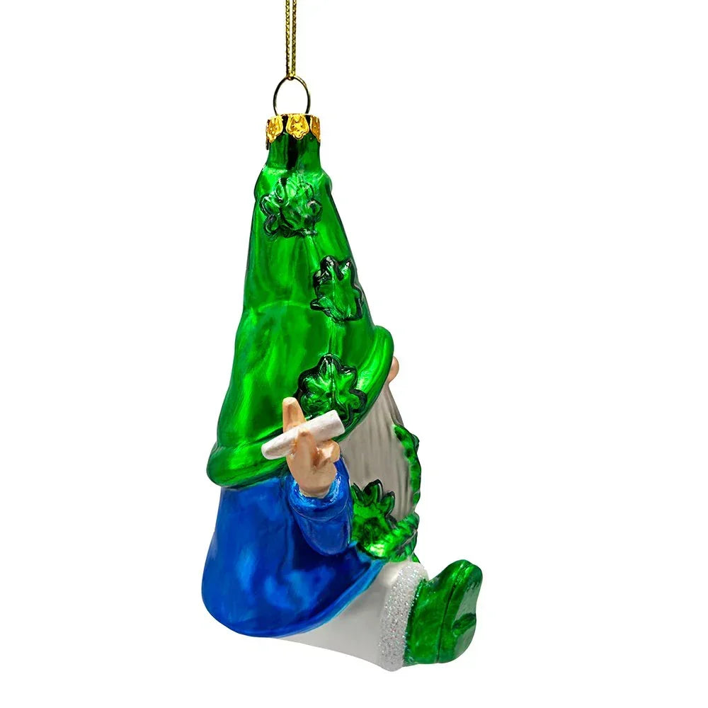 Glass gnome ornament with green shamrock hat, blue coat, and hanging loop on white background