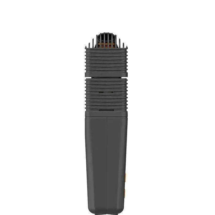 Portable black dry herb vaporizer with ribbed design, isolated on white background