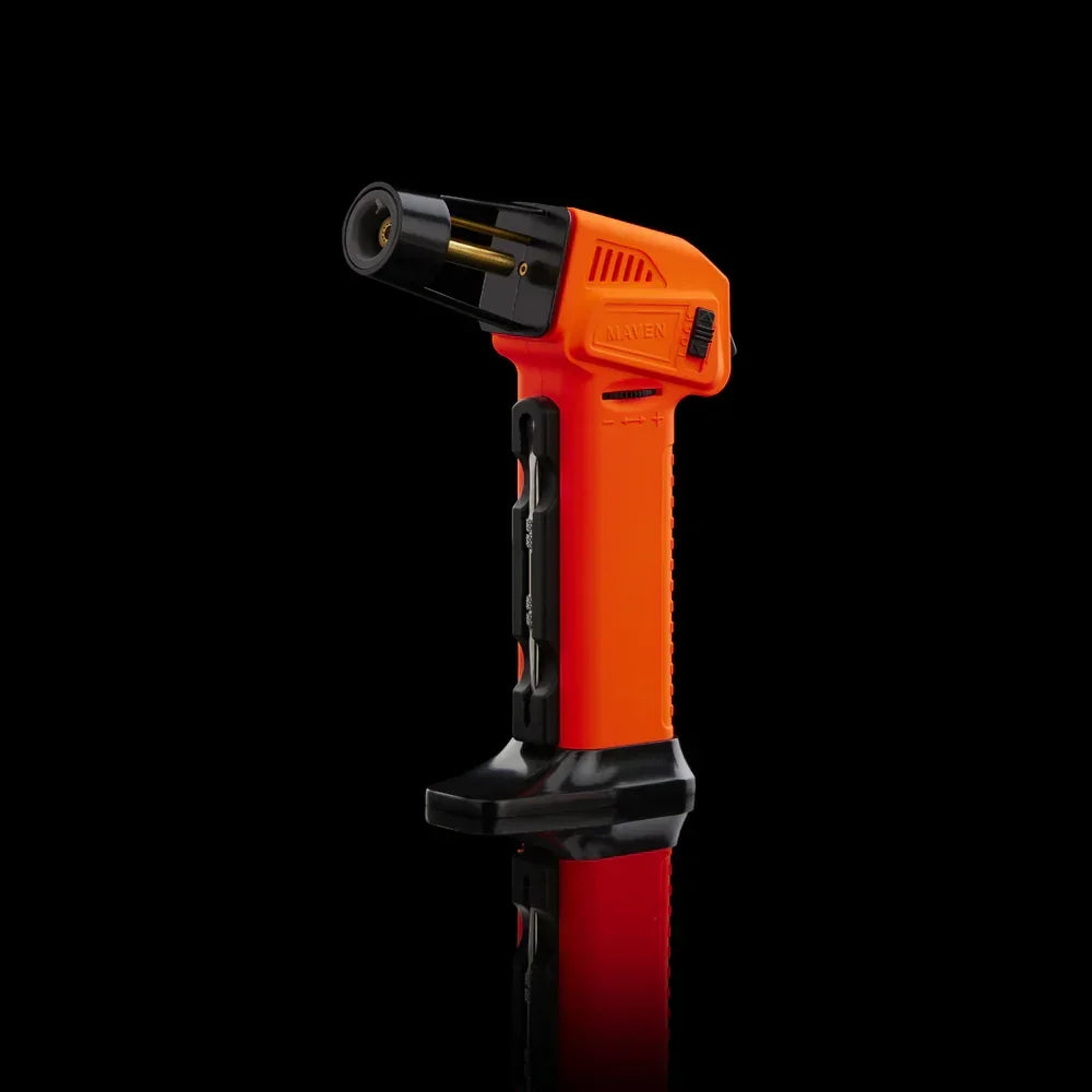 Orange handheld butane torch lighter with black accents on a black background