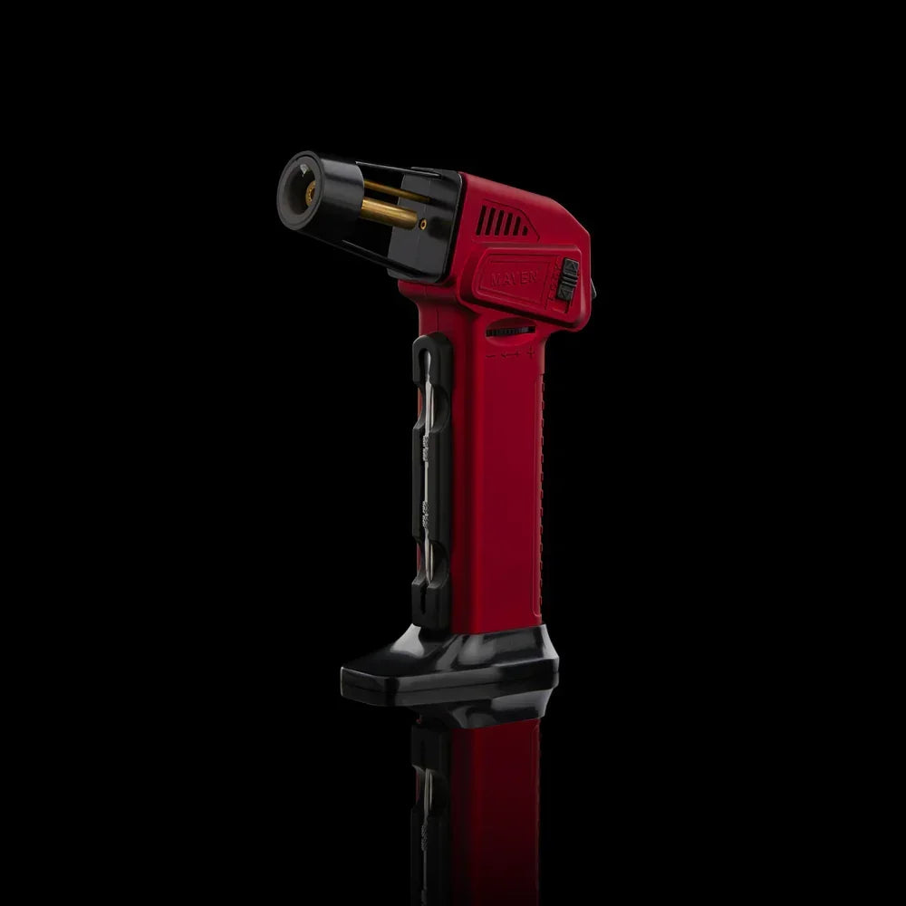 Red butane torch lighter with black base and angled nozzle on black background