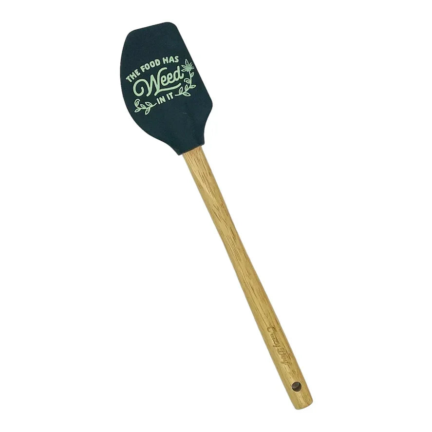 Wooden handle spatula with black head featuring 'The food has weed in it' text design.
