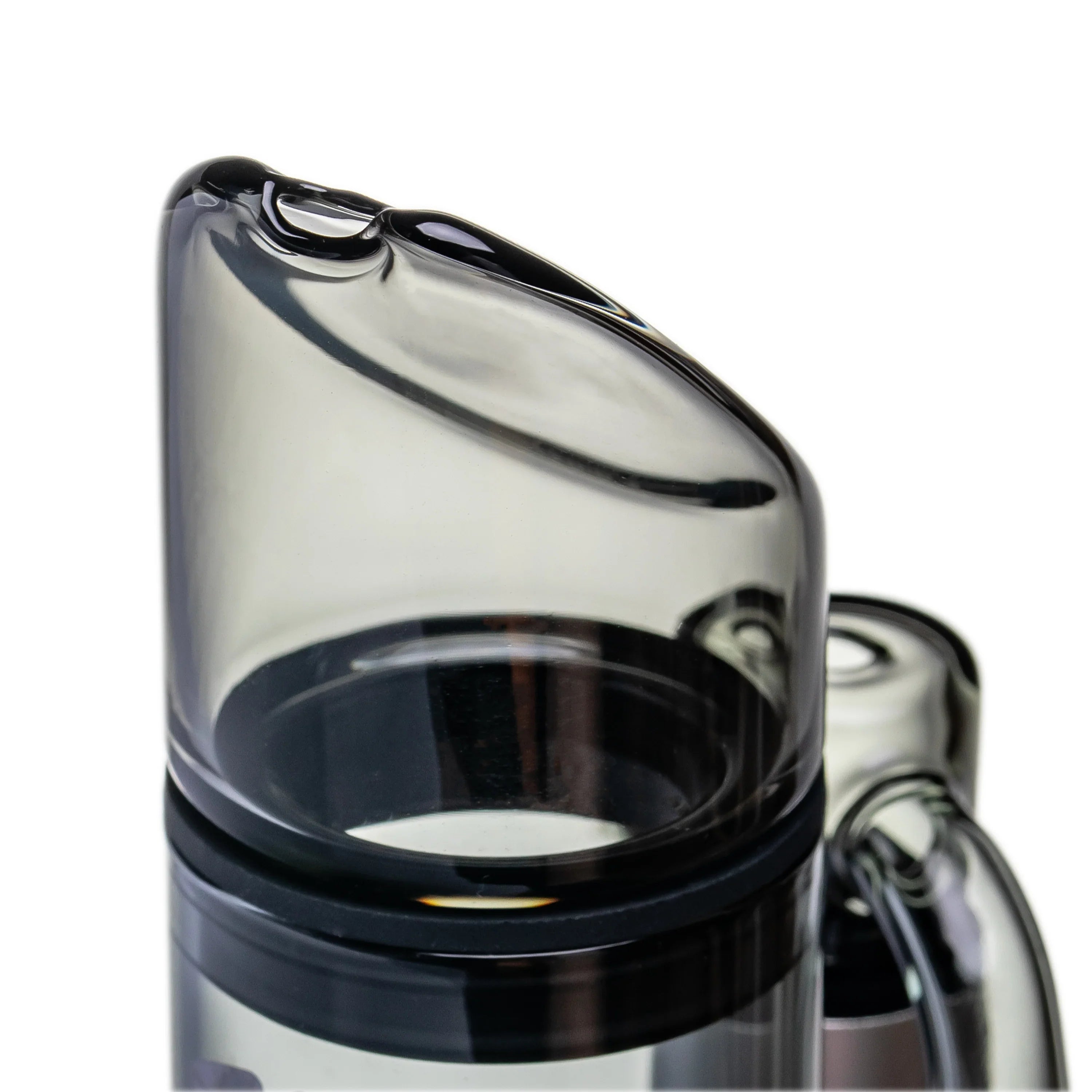 Close-up of a replacement smokeware glass mouthpiece with sleek, clear design on white background