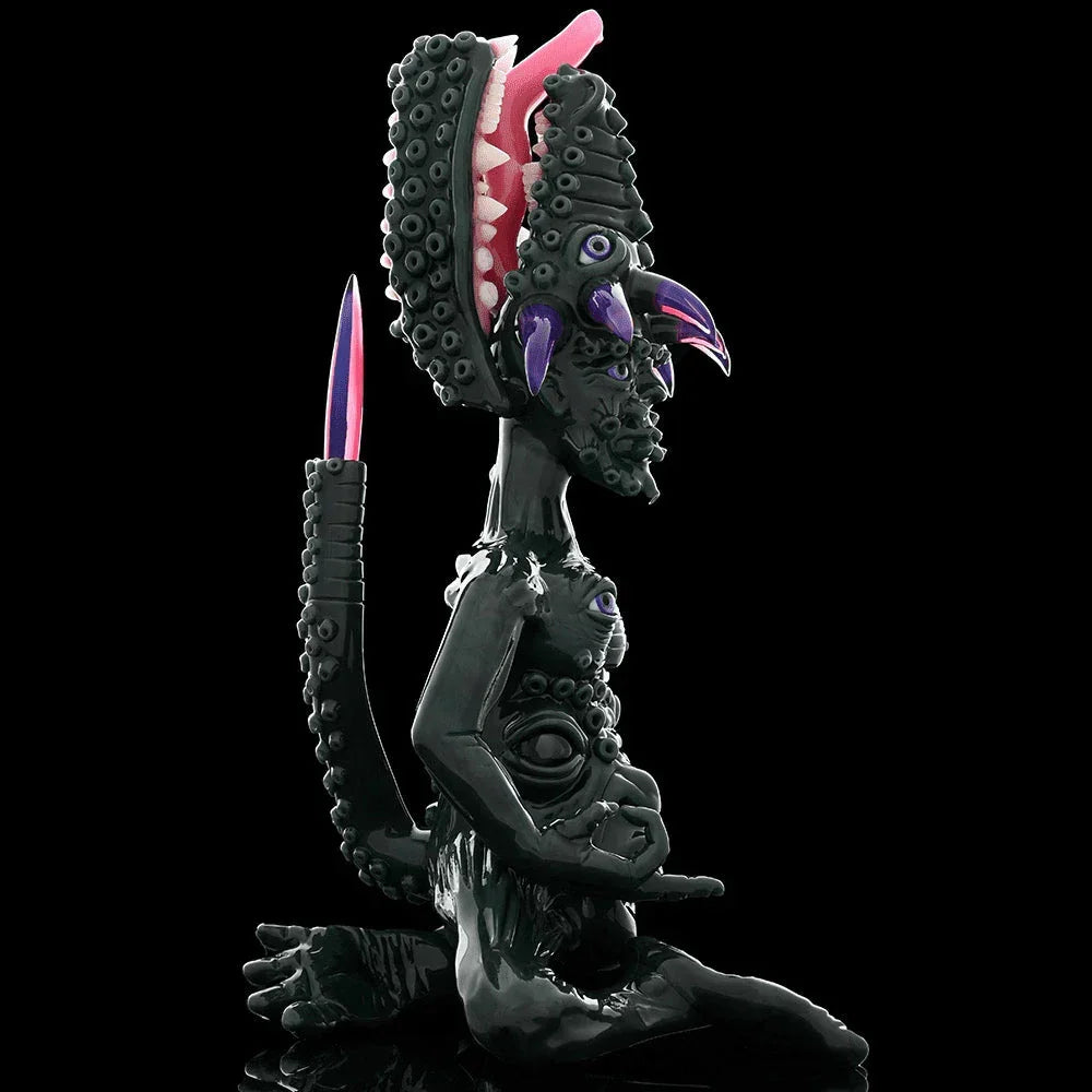 Heady glass art piece featuring an alien creature with tentacles, claws, and multiple eyes