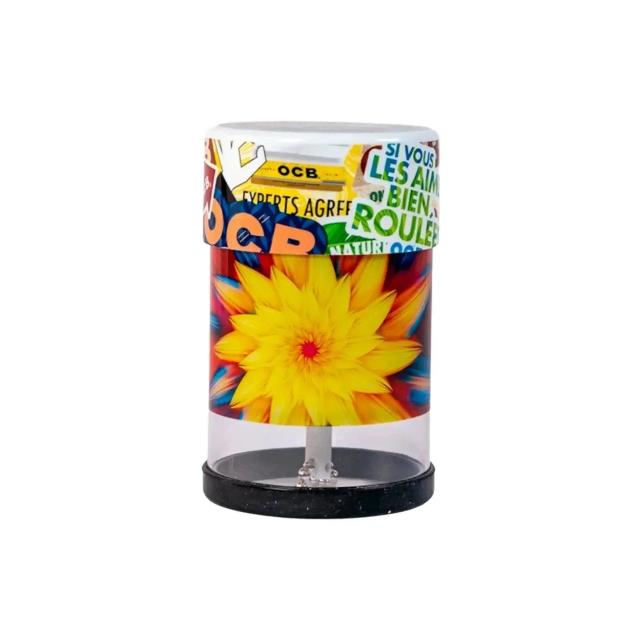 Colorful glass grinder with yellow flower design and bold lettering, smoking accessory