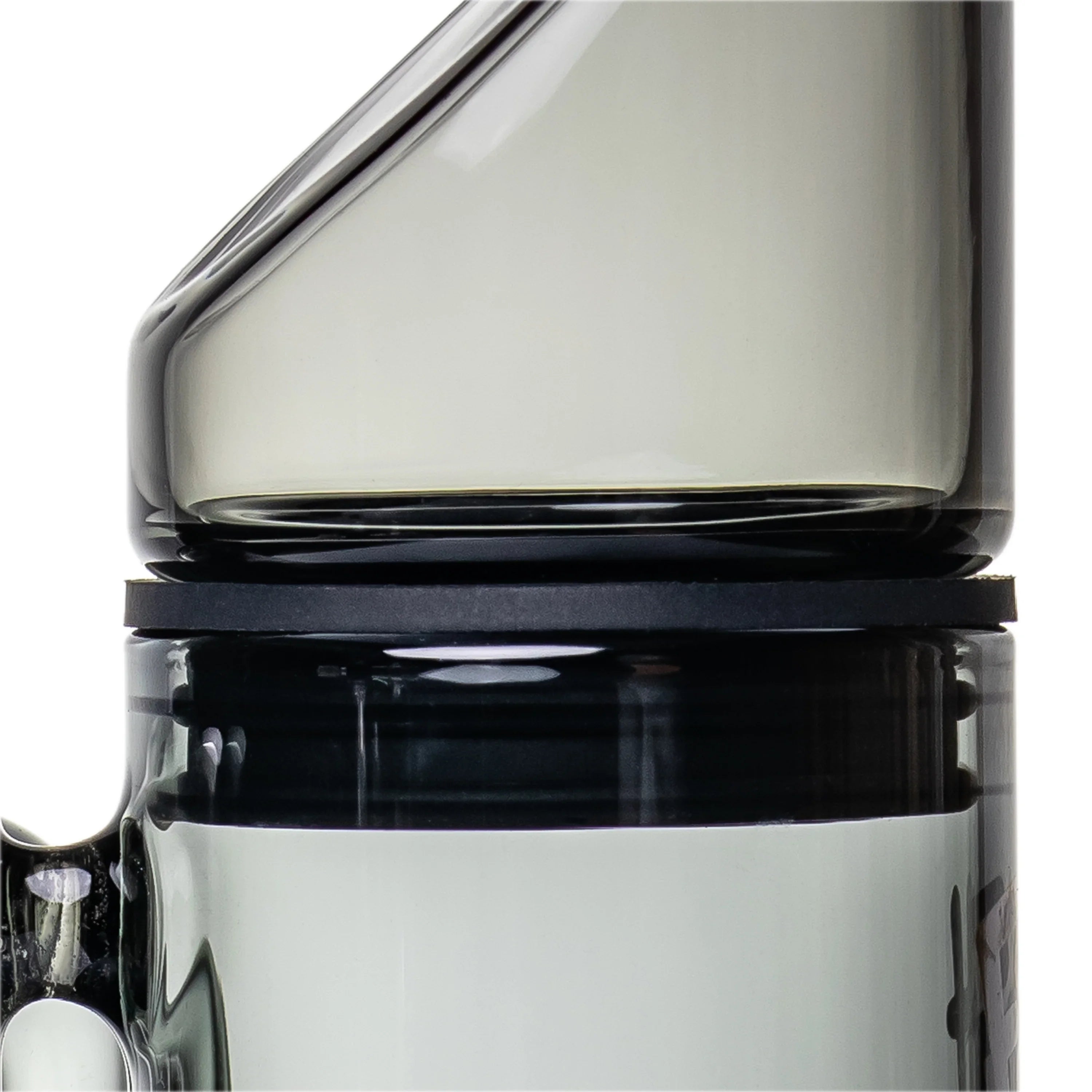 Closeup of modern glass vaporizer attachment with a sleek, smoky finish