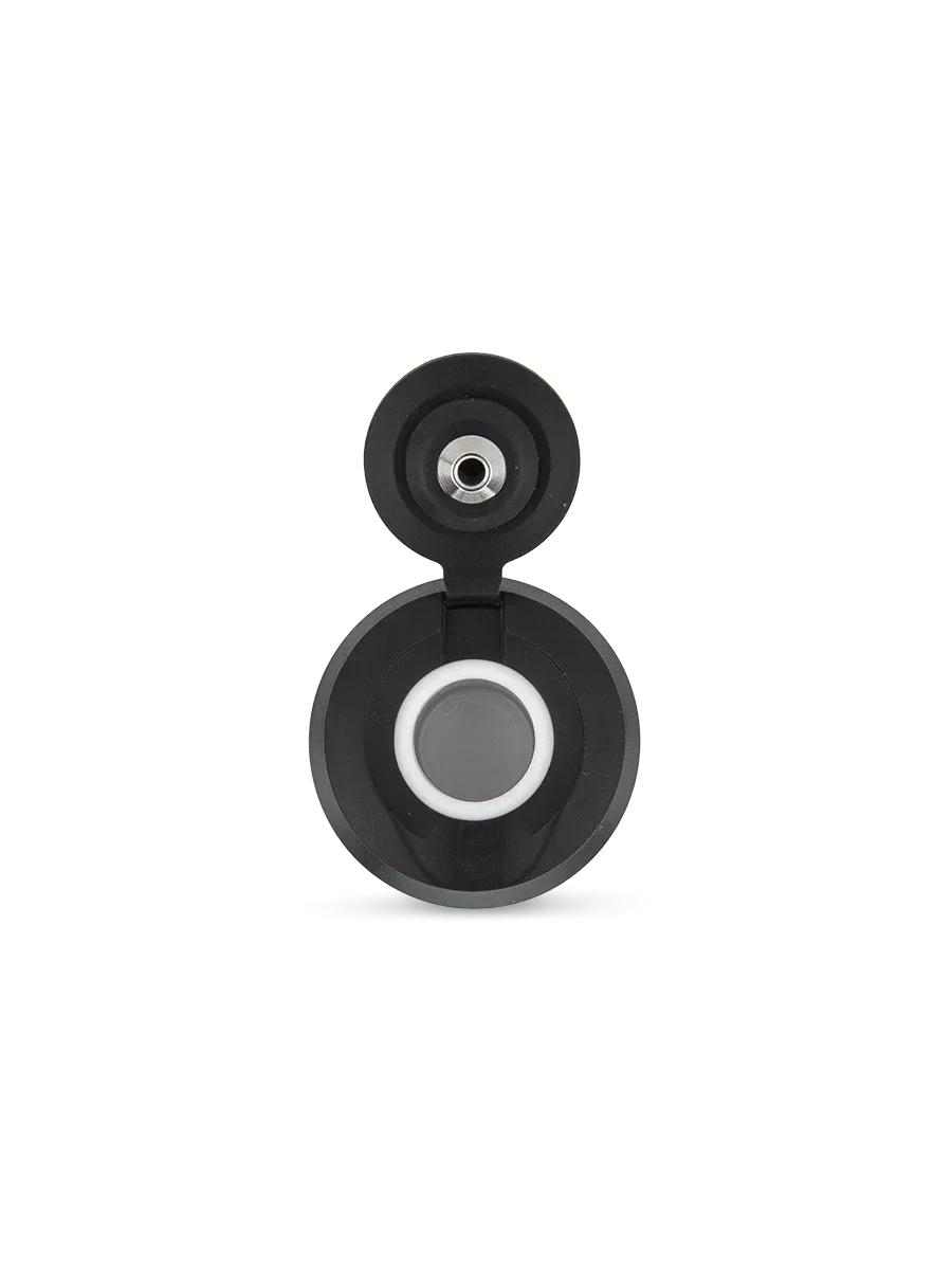 Top view of a black vaporizer accessory with an open lid and central metal chamber