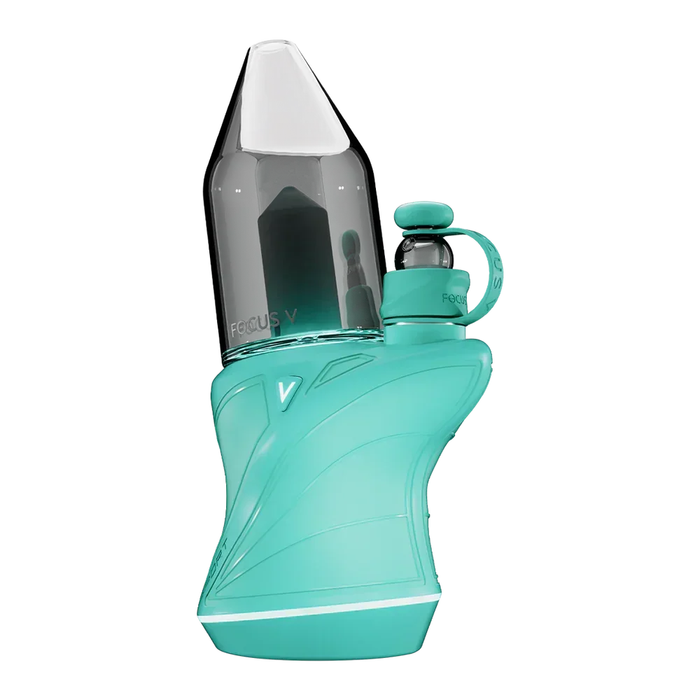Teal Focus V electronic dab rig with clear glass top and angled modern design