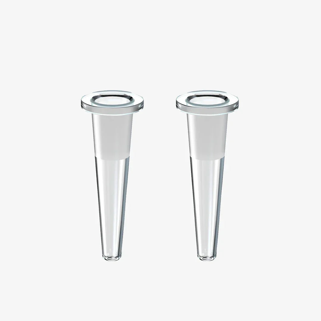 Pair of clear glass replacement downstems for water pipes on plain background