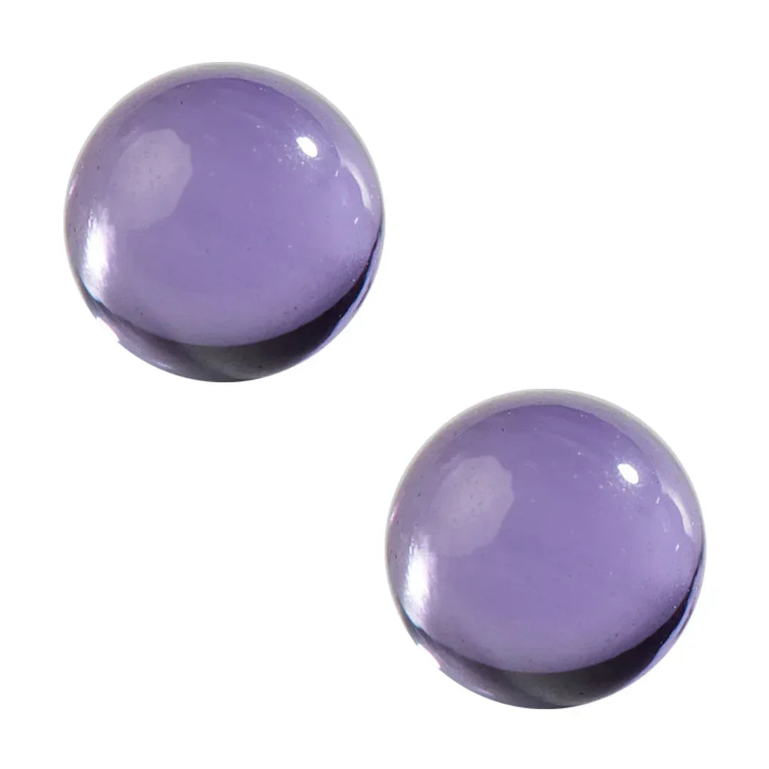 Pair of purple quartz terp pearls for dab rig accessories, isolated on white background