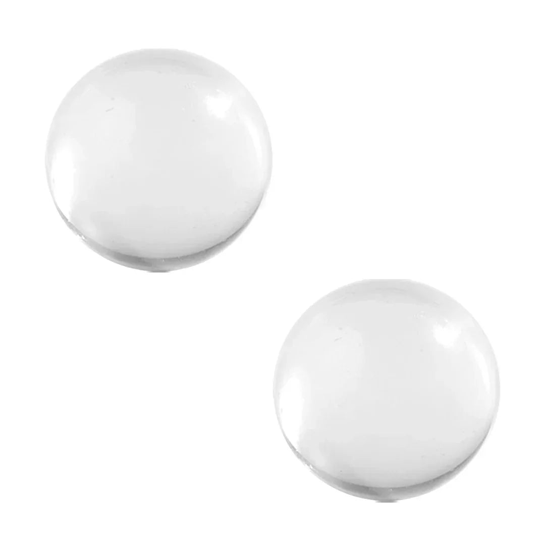 Two clear glass terp pearls on white background for vaporizer accessories