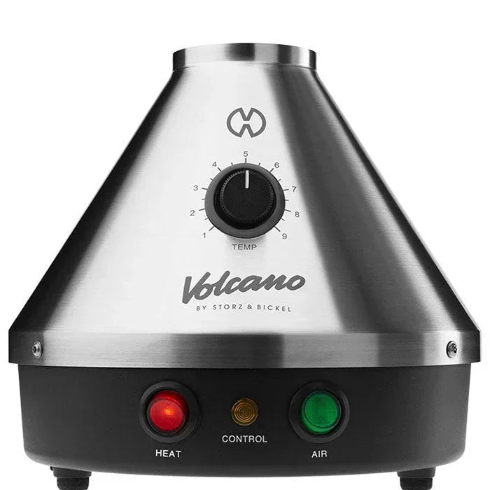 Stainless steel Volcano vaporizer with temperature dial and indicator lights, tabletop view