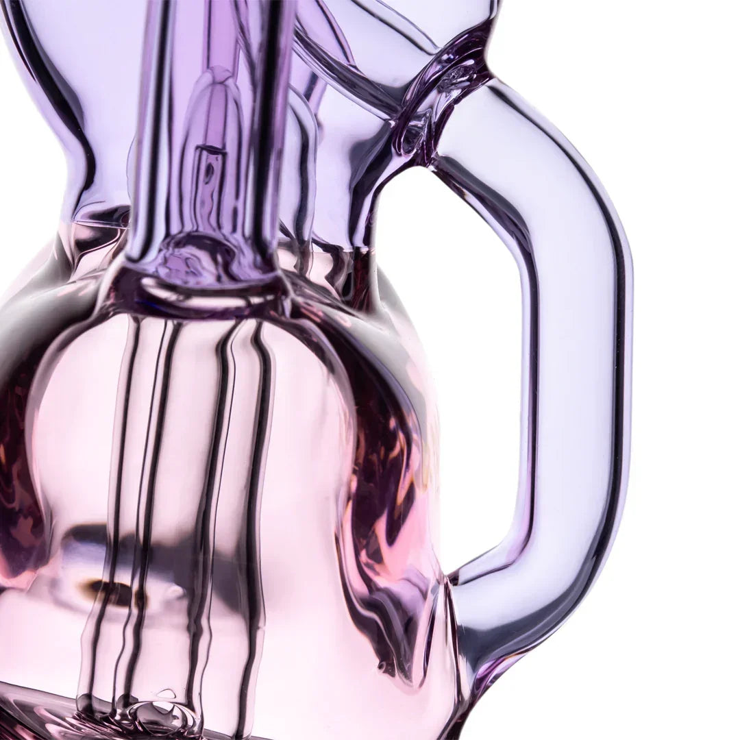 Close-up of a translucent purple glass water pipe with intricate tubing and handle details.
