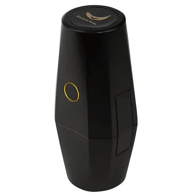 Sleek black electronic herb grinder with gold accent and compact modern design