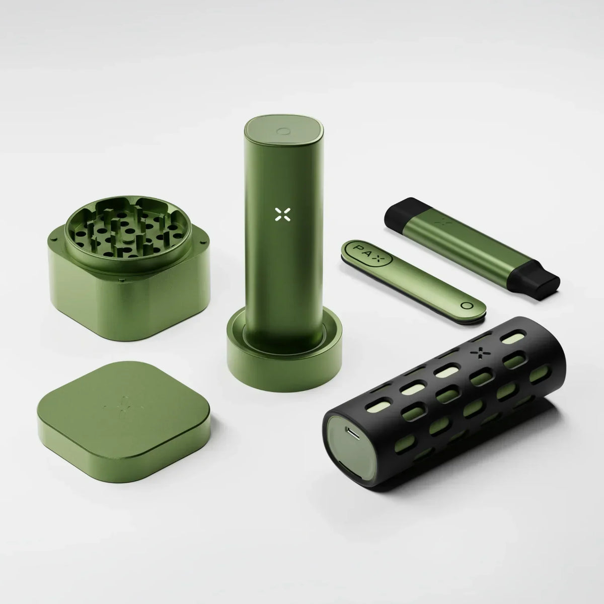 Green vaporizer kit with grinder, protective case, and accessories on white background