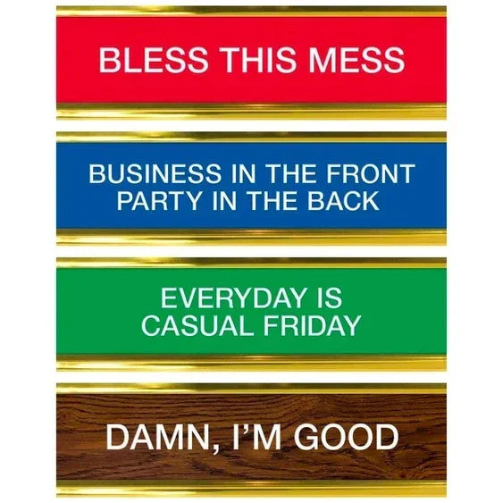 Set of colorful desk nameplates with humorous sayings on red, blue, green, and wood backgrounds.