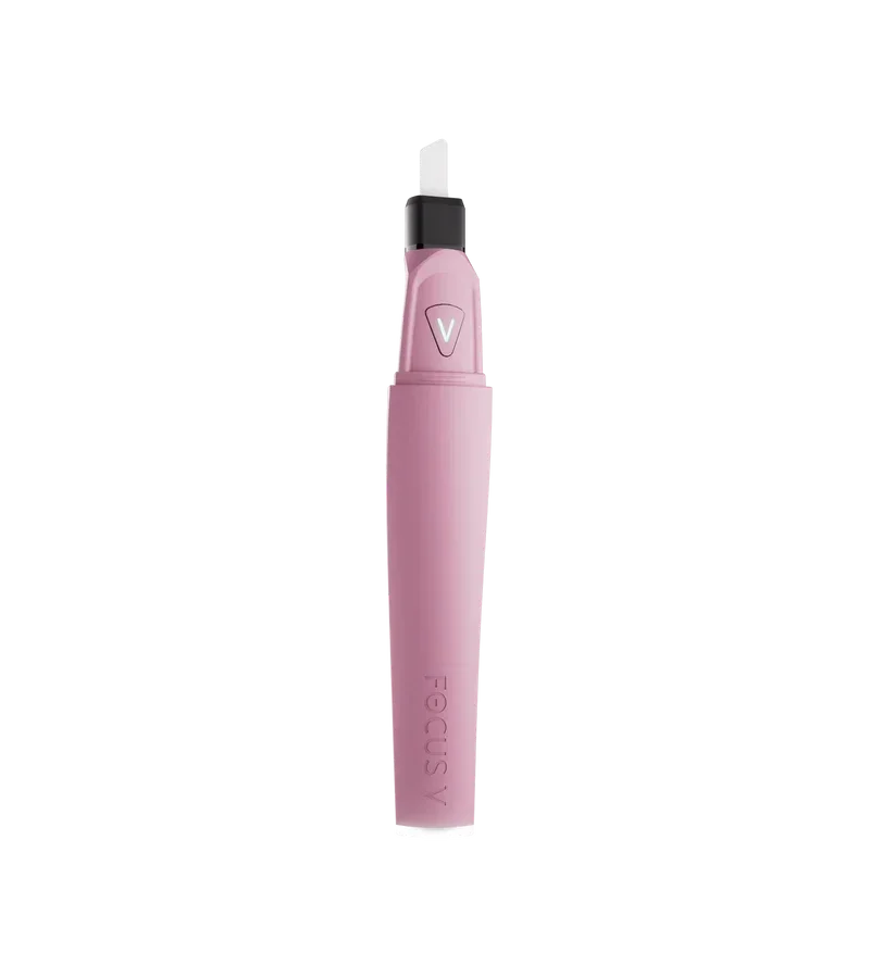 Pink portable vaporizer pen with black mouthpiece, isolated on black background