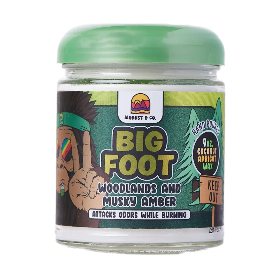 Big Foot woodlands and musky amber 9oz coconut apricot wax odor eliminating candle jar